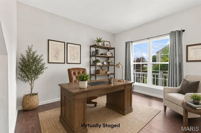 Virtually Staged Home Office or Living Room located in the front of the home off of the entry foyer. — 104 Towergate Drive, Lake St. Louis, MO 63367