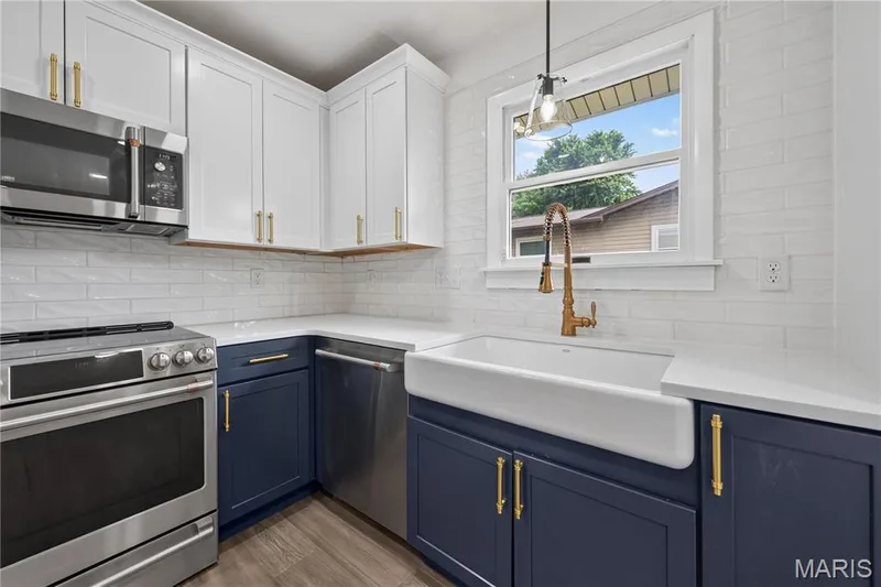 Large Farmhouse Sink and Stainless Steel Applainces — 608 Mosport Drive, St Charles, MO 63304