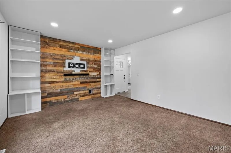 Accent Wall and Bookcases in Living Room — 608 Mosport Drive, St Charles, MO 63304