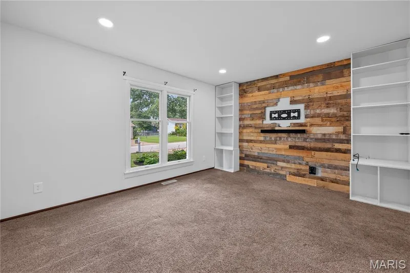 Living Room with Accent Wall — 608 Mosport Drive, St Charles, MO 63304