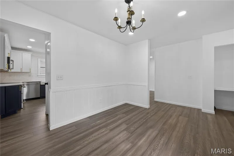 Dining Room open to Kitchen and Entry Foyer — 608 Mosport Drive, St Charles, MO 63304