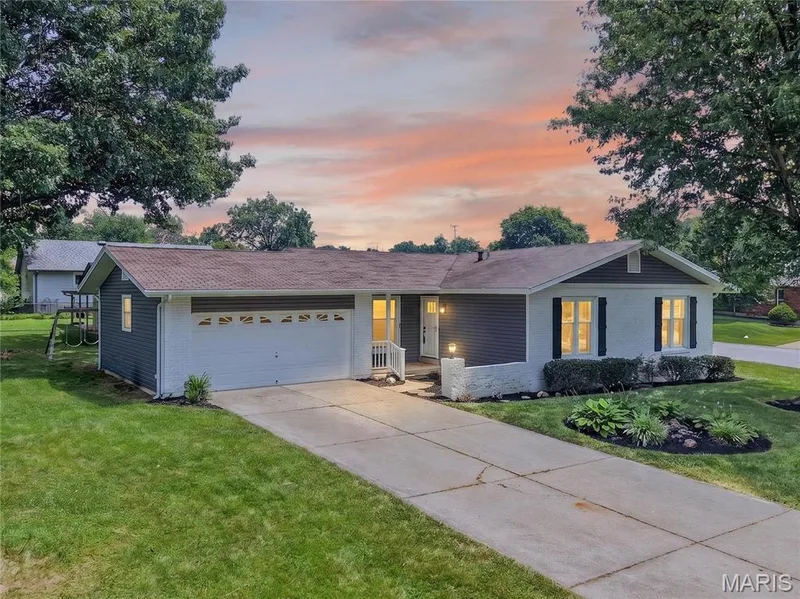 Front Elevation at Dusk — 608 Mosport Drive, St Charles, MO 63304