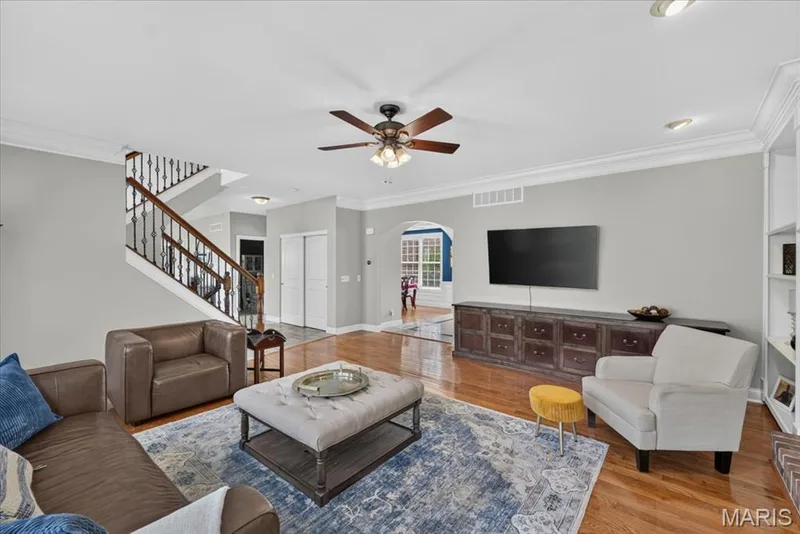 The Great Room showing the back staircase to the upper level. — 31 Pinewood Court, Dardenne Prairie, MO 63368