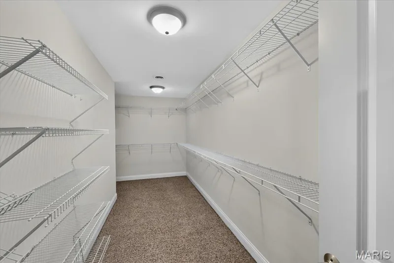 The Primary Suite has a very large walk in closet. — 31 Pinewood Court, Dardenne Prairie, MO 63368