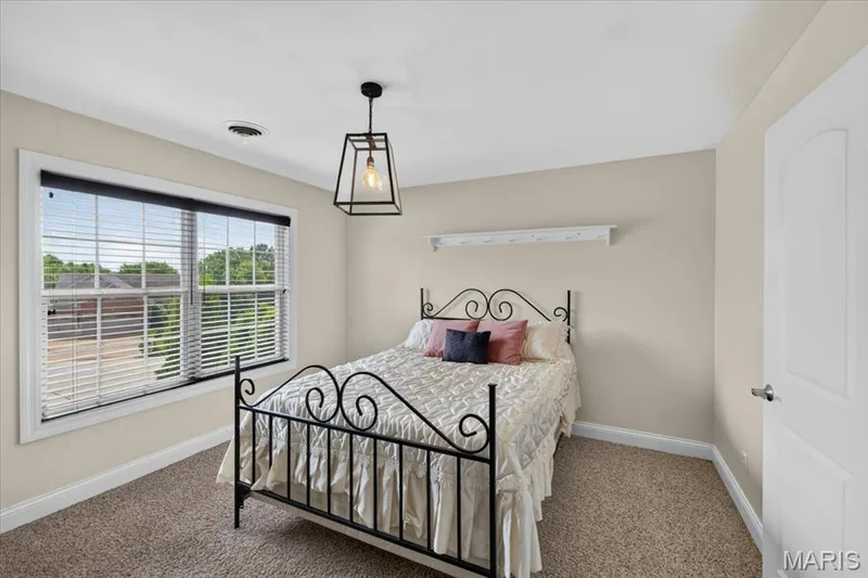 Bedroom 2 features a walk in closet and is connected to Bedroom 3 by a Jack and Jill bath. — 31 Pinewood Court, Dardenne Prairie, MO 63368