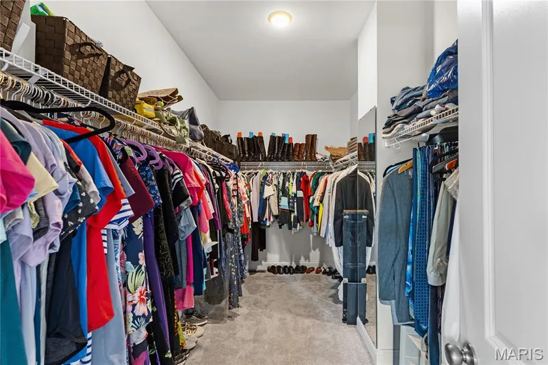 Generous walk-in closet in primary suite. — 1316 Silver Fern Drive, Lake St. Louis, MO 63367