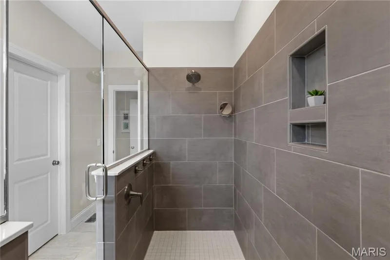 Featuring custom gray subway tile and tasteful finishes. — 1316 Silver Fern Drive, Lake St. Louis, MO 63367