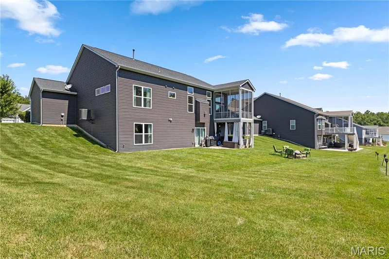 Here, nature isn't just nearby—it's part of everyday life. — 1316 Silver Fern Drive, Lake St. Louis, MO 63367