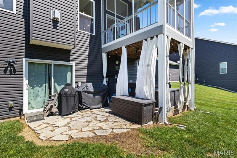 And unwind in the included hot tub after a long day. — 1316 Silver Fern Drive, Lake St. Louis, MO 63367