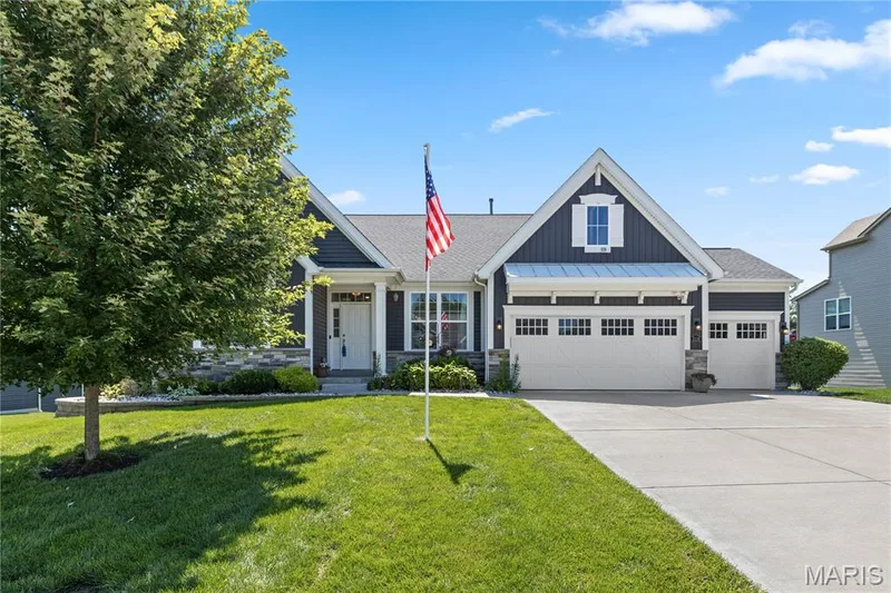 This isn't simply a beautiful home—it's a place to slow down, spread out, and enjoy the lifestyle you've been looking for. — 1316 Silver Fern Drive, Lake St. Louis, MO 63367