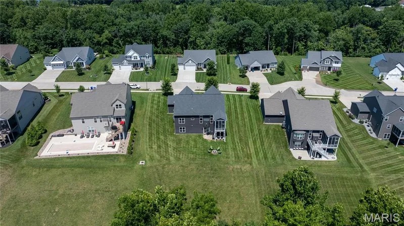 Only twenty homes at the end of Silver Fern Drive enjoy Lake St. Louis privileges. — 1316 Silver Fern Drive, Lake St. Louis, MO 63367