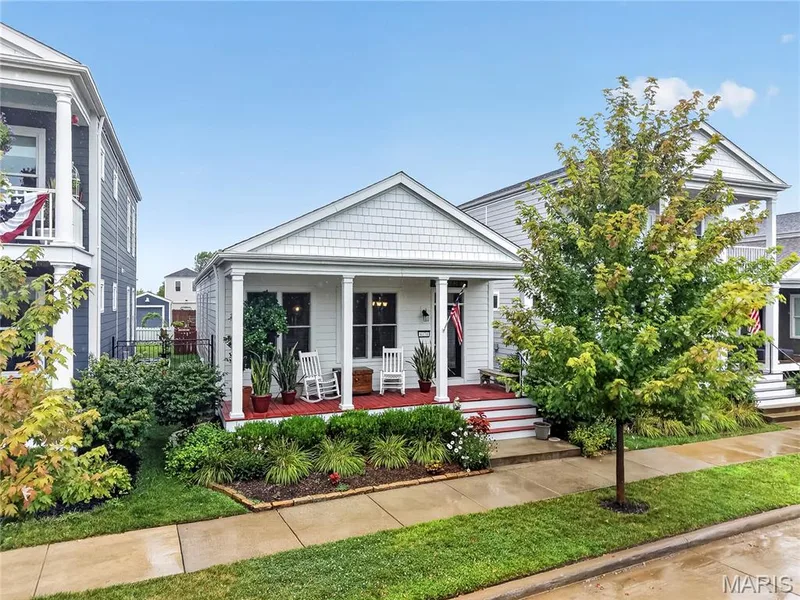 You will love the views of the Sunrise from the EXPANSIVE Front Porch! — 6170 Suntan Drive, St Charles, MO 63301