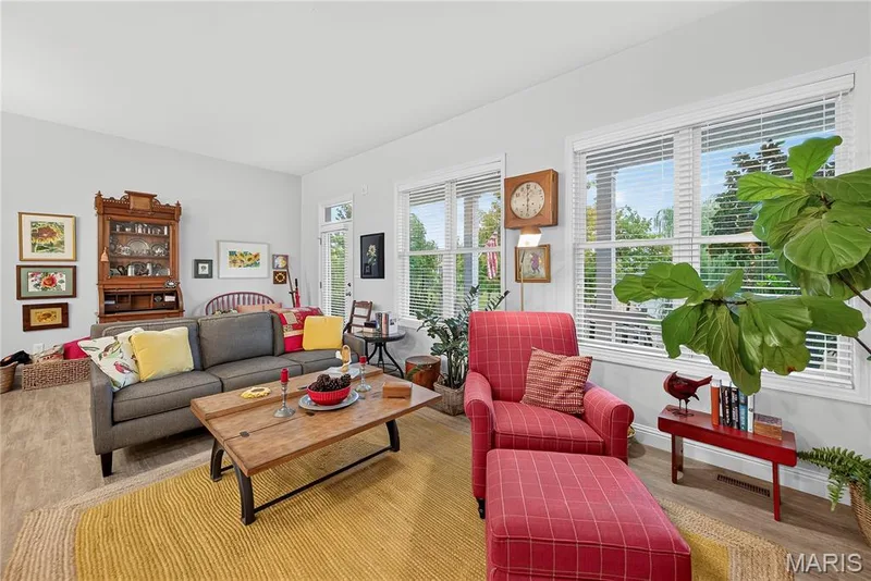 You will LOVE the 10' Tall Ceilings and the WALL OF WINDOWS that really let the VIEWS of the Trees, Beach & Water be ENJOYED! — 6170 Suntan Drive, St Charles, MO 63301