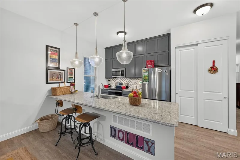 You will LOVE the Eat-In Kitchen with Counter Seating & LOTS of Counter Space to use anyway you like! — 6170 Suntan Drive, St Charles, MO 63301