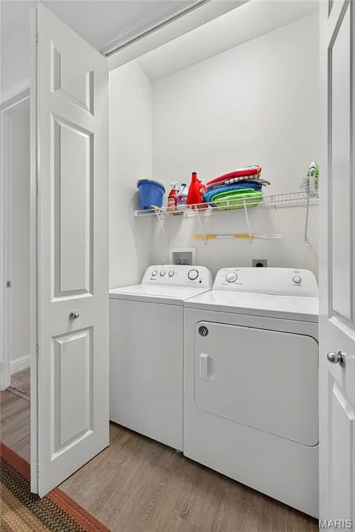 Easy to use Laundry with Wire Shelving & Lighting!  Washer & Dryer stays! — 6170 Suntan Drive, St Charles, MO 63301