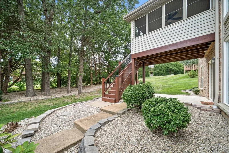 Backing to Bear Creek Golf Course overlooking trees/tee box. — 3416 Sun Bear Court #830C, Wentzville, MO 63385