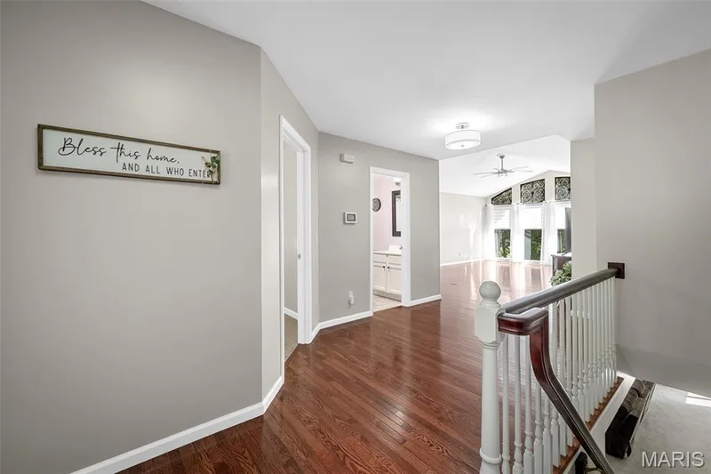 Entry foyer with beautiful hardwood flooring. — 3416 Sun Bear Court #830C, Wentzville, MO 63385