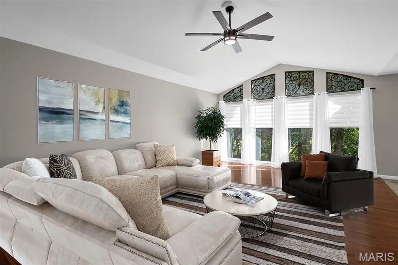 Spacious great room. Dining area can also be accommodated next to the wall of windows. — 3416 Sun Bear Court #830C, Wentzville, MO 63385