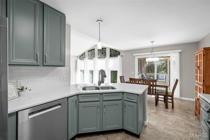 Custom cabinetry, marble backsplash and quartz countertops. — 3416 Sun Bear Court #830C, Wentzville, MO 63385