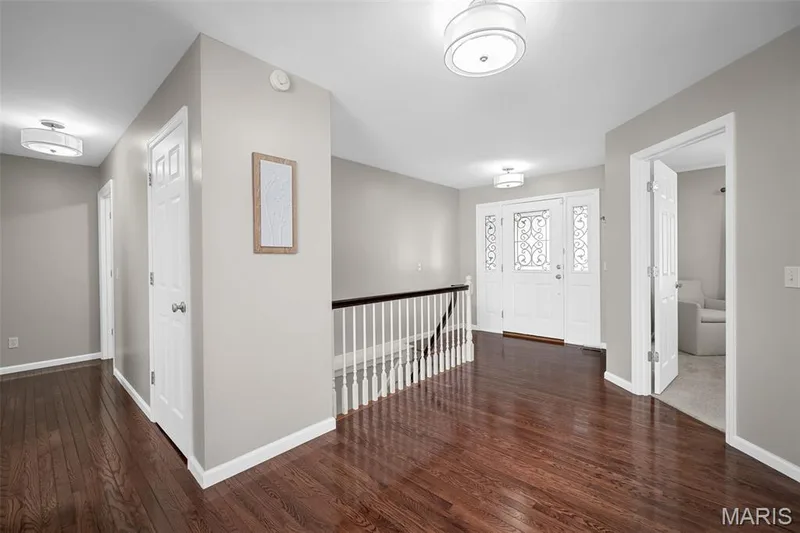 Entry foyer with stairs to the LL. — 3416 Sun Bear Court #830C, Wentzville, MO 63385