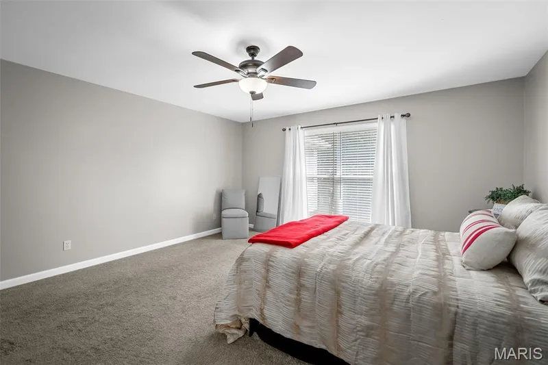 Spacious primary bedroom fits large furniture. — 3416 Sun Bear Court #830C, Wentzville, MO 63385