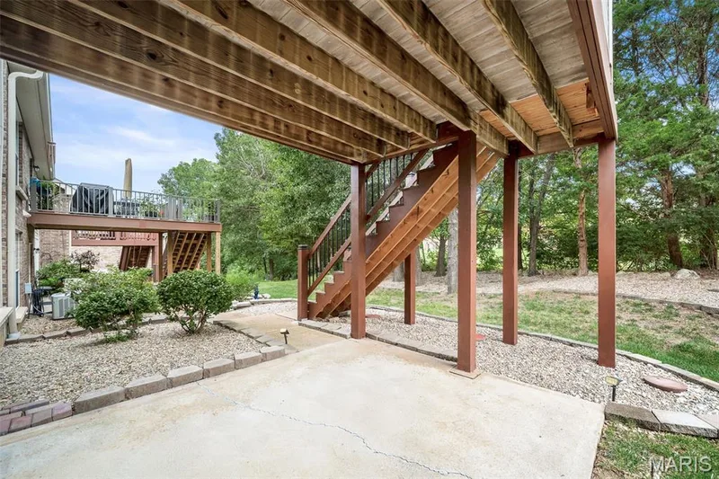 Nice size patio under the screened in porch/deck. — 3416 Sun Bear Court #830C, Wentzville, MO 63385