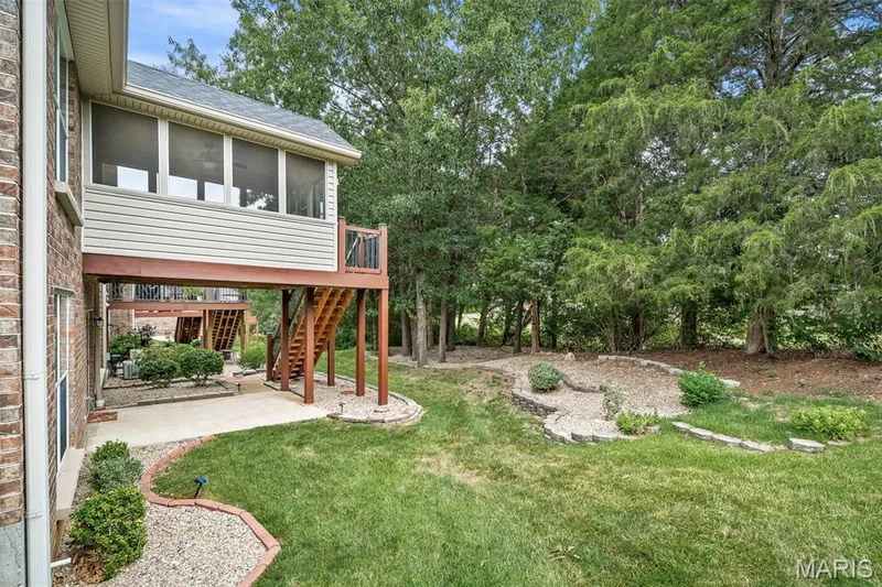 Backing to trees, landscaping and large patio. — 3416 Sun Bear Court #830C, Wentzville, MO 63385