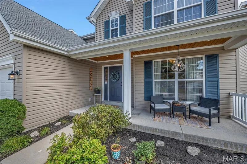 Cute front porch to relax on — 202 Wyndtrace Court, Lake St. Louis, MO 63367