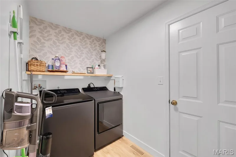 Laundry/mud room located right off garage — 202 Wyndtrace Court, Lake St. Louis, MO 63367
