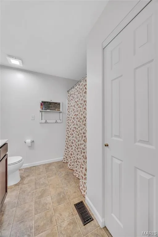 Linen closet in primary bath — 202 Wyndtrace Court, Lake St. Louis, MO 63367