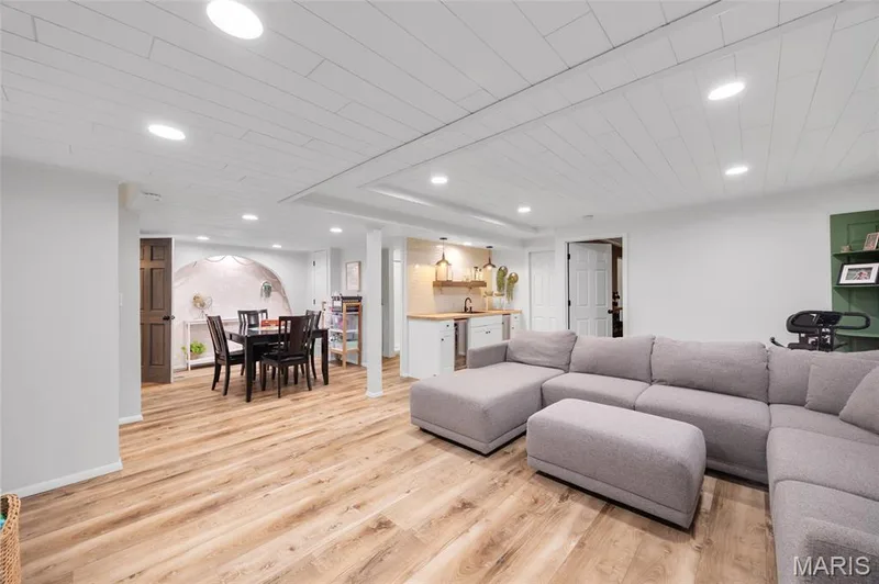 Ample space for everyone to hang out in this amazing lower level rec room — 202 Wyndtrace Court, Lake St. Louis, MO 63367