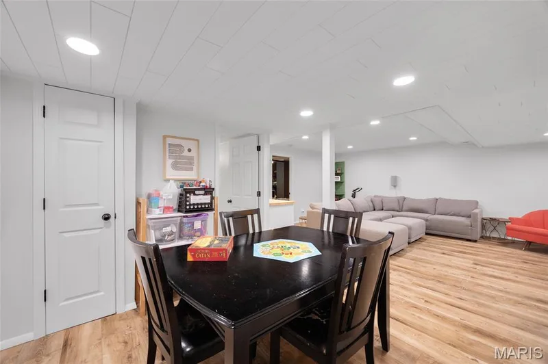 Plenty of space to hang out, play games, or relax in this basement — 202 Wyndtrace Court, Lake St. Louis, MO 63367