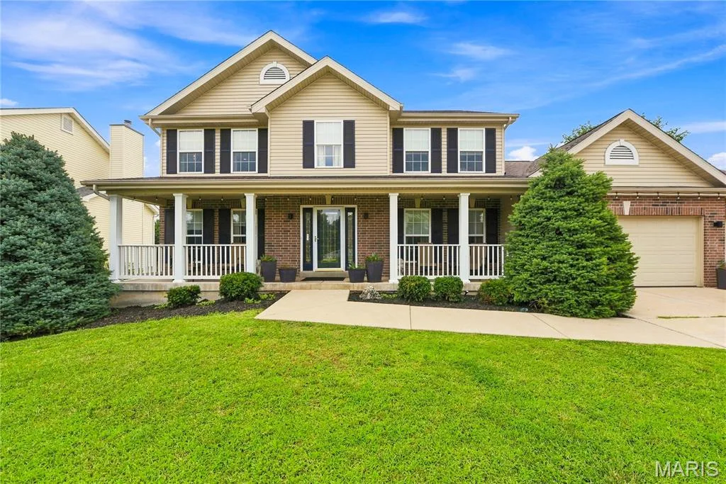 Classic Curb Appeal with a Welcoming Front Porch — 539 Sunshine Brook Drive, Wentzville, MO 63385