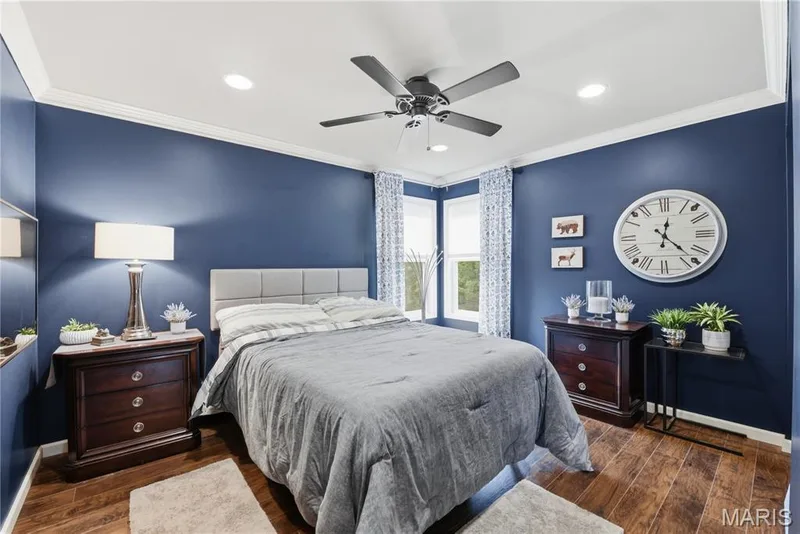 Secondary bedroom accented by rich tones — 539 Sunshine Brook Drive, Wentzville, MO 63385