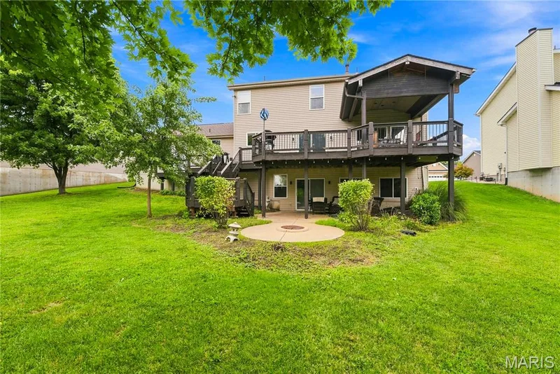 Sophisticated outdoor spaces designed for gathering and relaxation — 539 Sunshine Brook Drive, Wentzville, MO 63385