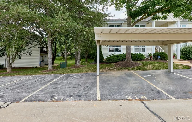 One covered designated parking space and one uncovered designated parking space — 214 Sugar Lake Drive #5, St Peters, MO 63376