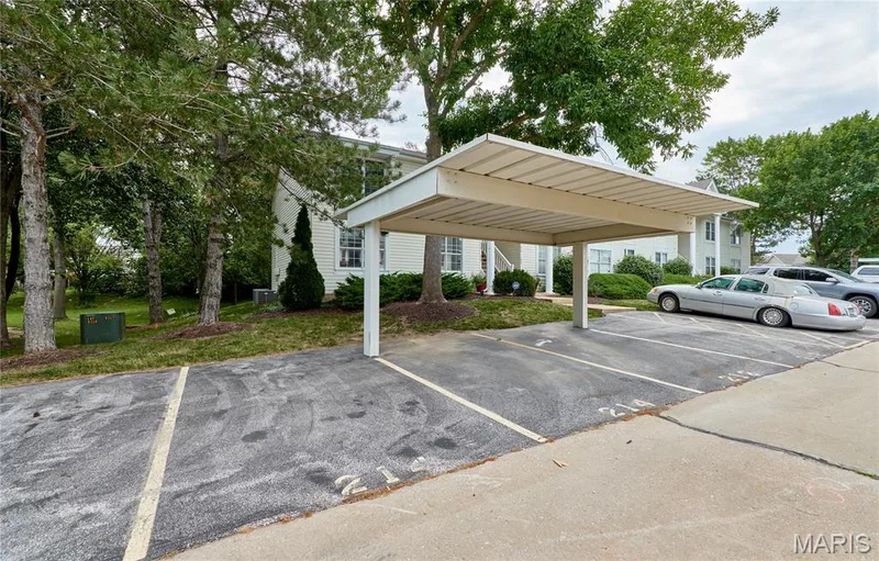 One covered designated parking space and one uncovered designated parking space — 214 Sugar Lake Drive #5, St Peters, MO 63376