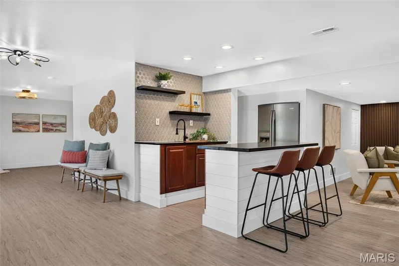 Kitchen/Bar Area with Sink & Built-in Refrigerator — 512 Meadowfield Lane, Wentzville, MO 63385