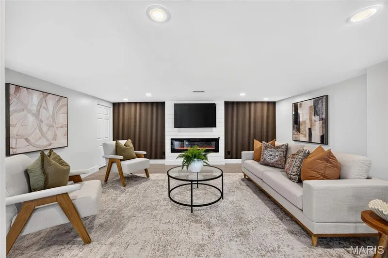 Very cool Family Room w/ Fireplace for Ambiance and Recessed Lighting. — 512 Meadowfield Lane, Wentzville, MO 63385