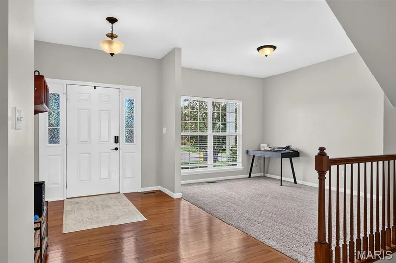 Entry foyer with living room — 743 Springfield Drive, Wentzville, MO 63385