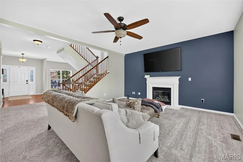 Family room with gas fireplace — 743 Springfield Drive, Wentzville, MO 63385
