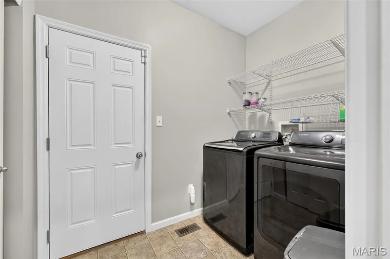 Main floor laundry across from mudroom — 743 Springfield Drive, Wentzville, MO 63385