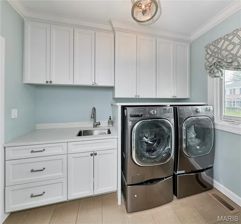 There is also a "Cook's Bathroom" just off the Laundry Room — 2323 Wellington Estates Drive, Chesterfield, MO 63017