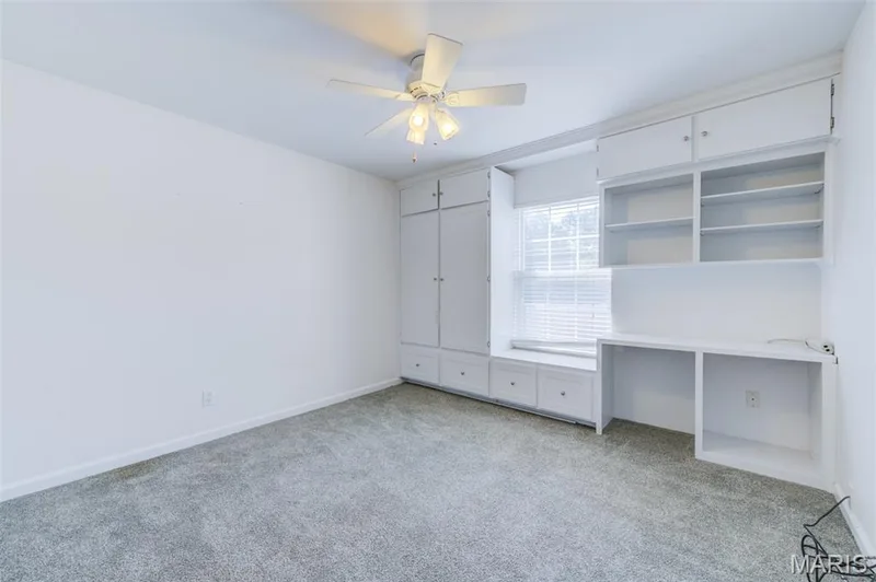 Bedroom to the left as you walk in with enough built-in space not to need a dresser. — 480 Benton Drive #F, St Peters, MO 63376