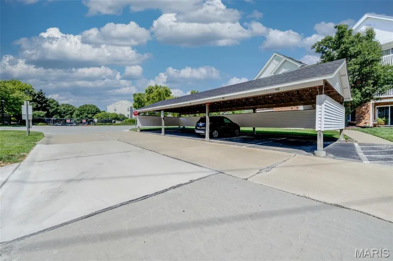 Covered parking structure - #39 is yours.  Additional parking adjacent to the building. — 480 Benton Drive #F, St Peters, MO 63376