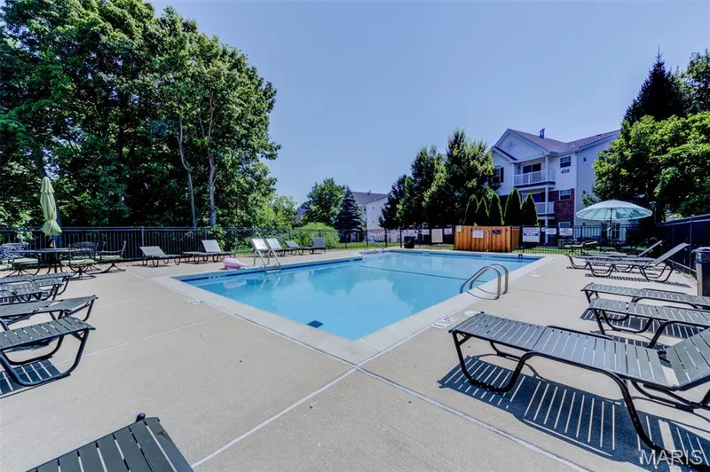 Neighborhood swimming pool, a big enough cannon ball cannot splash everyone. — 480 Benton Drive #F, St Peters, MO 63376