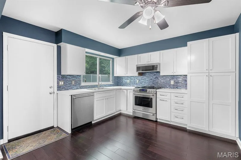 Kitchen with stainless appliances — 11 Victoria Square, St Peters, MO 63376
