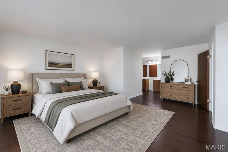 Virtually Staged main floor primary bedroom with dual sinks and walk-in closet. — 11 Victoria Square, St Peters, MO 63376