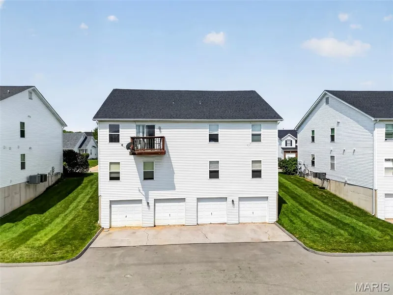Single car garage.  Second from the left. — 618 Homerun Drive, O'Fallon, MO 63366