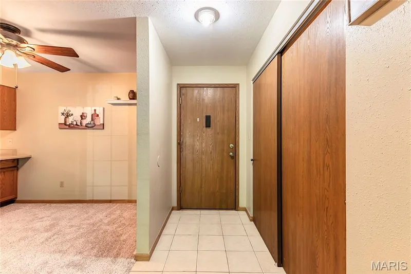Come on in! There's lots of room for everyone's coats in the large hall closet. — 1440 Heritage Landing #105, St Charles, MO 63303